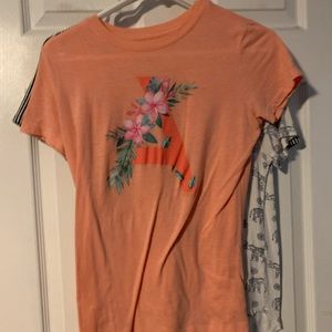 Aero pastel peach colored shirt warn once